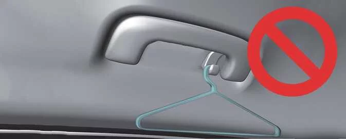Kia Picanto clothes hanger warning against hanging hard objects