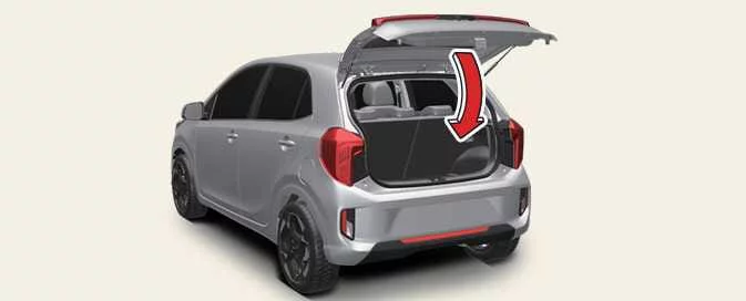 Kia Picanto tailgate being lowered and pressed down to engage the latch