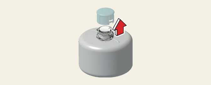 Removing the cap from the Kia Picanto Tyre Mobility Kit sealant bottle